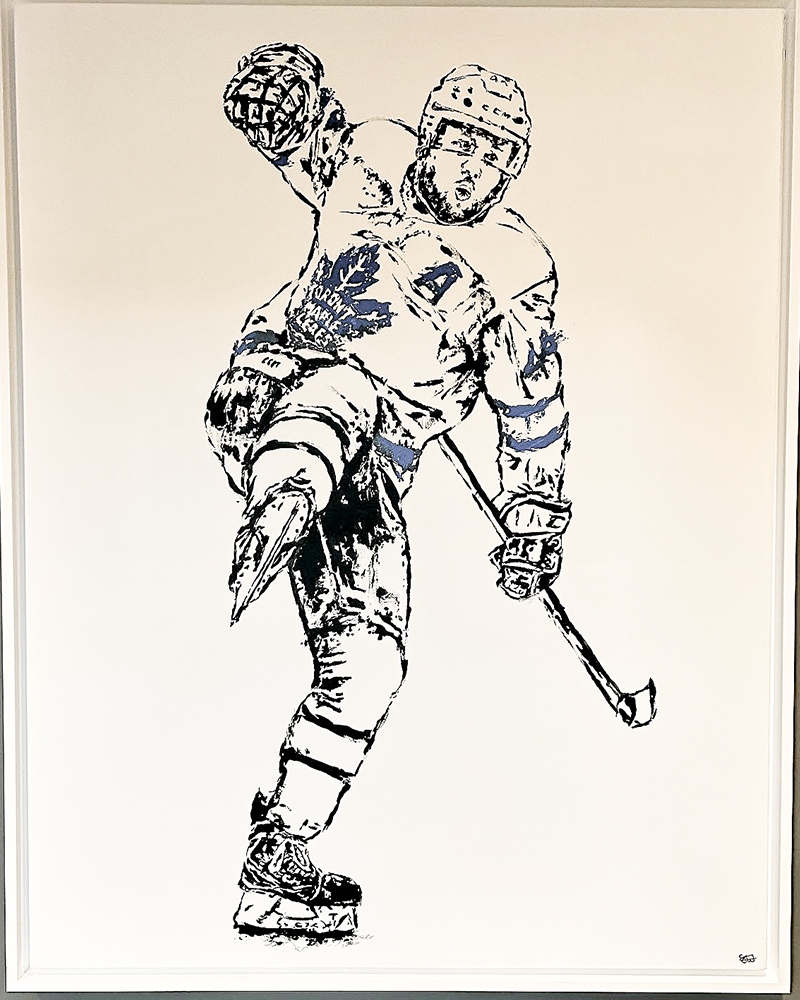 Woj in front of her portrait of Serena Williams