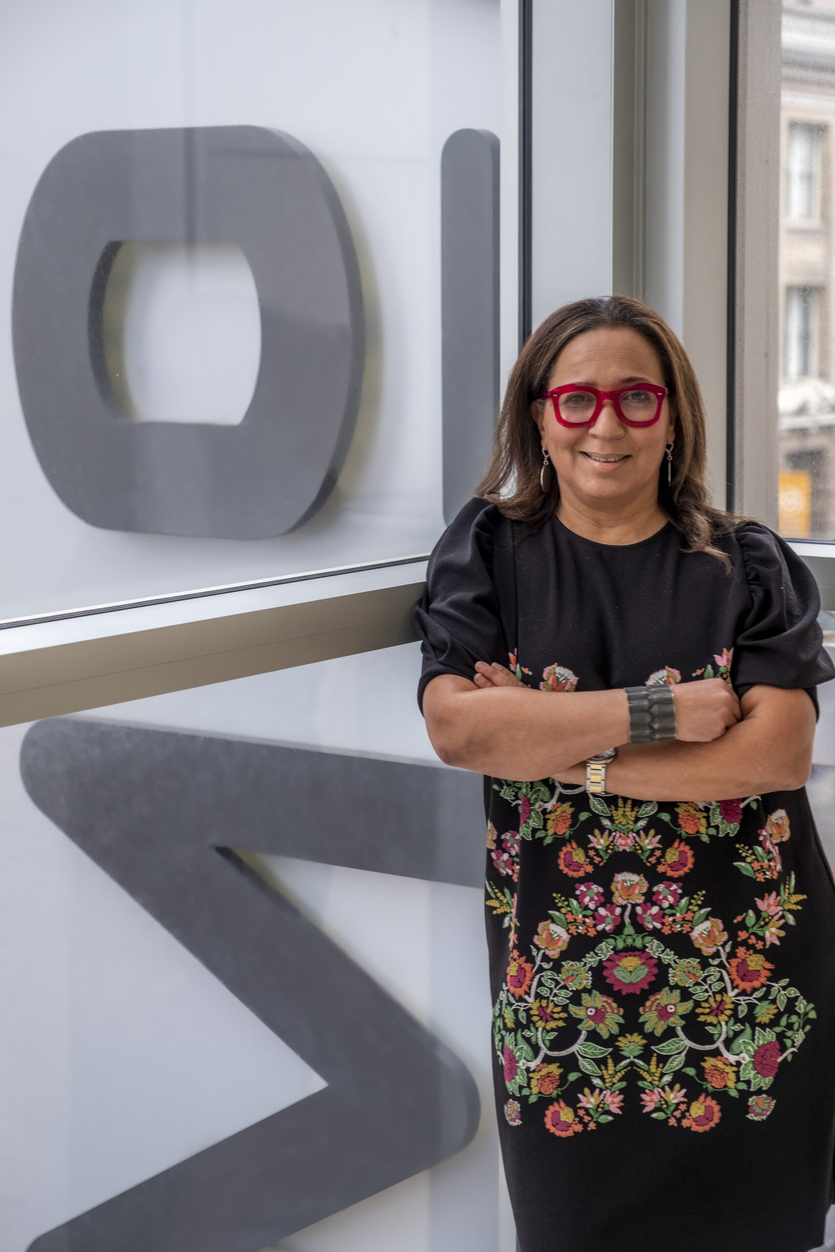 Smiling woman in floral dress