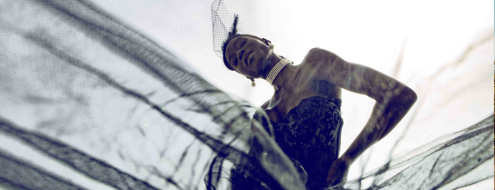 Model posing in fashion silhouette