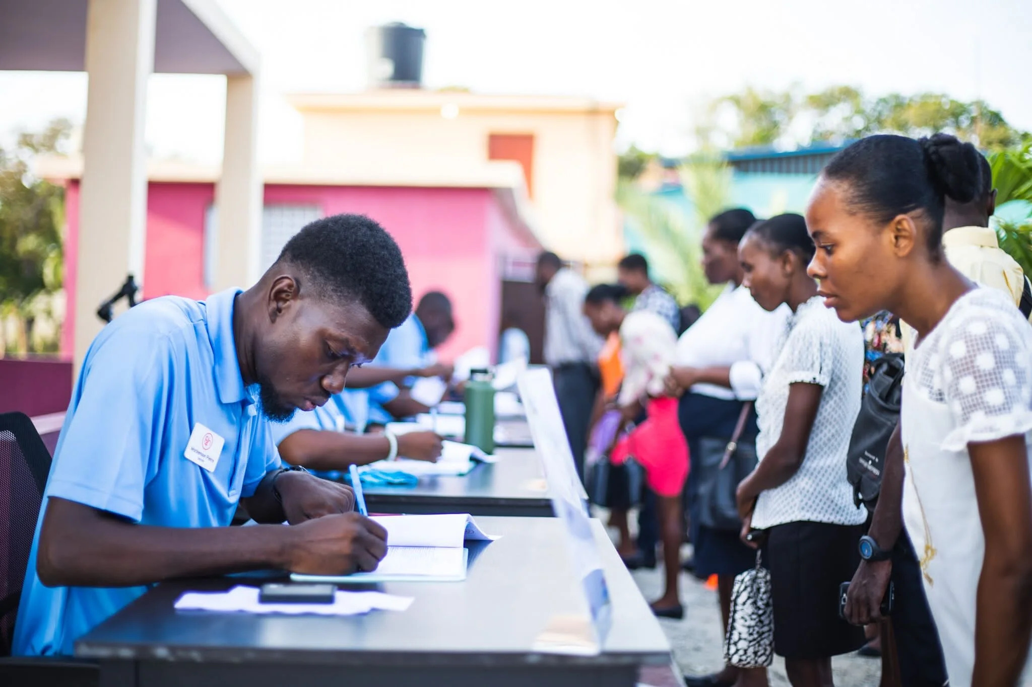 P4H cofounder training Haitian teachers