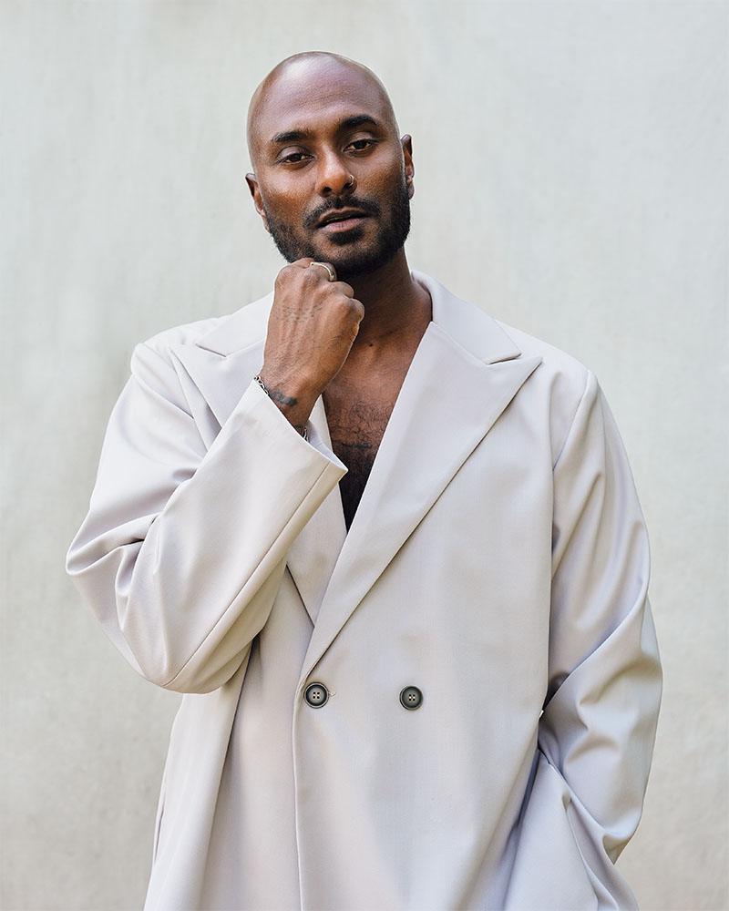 Manoj Dias in white coat