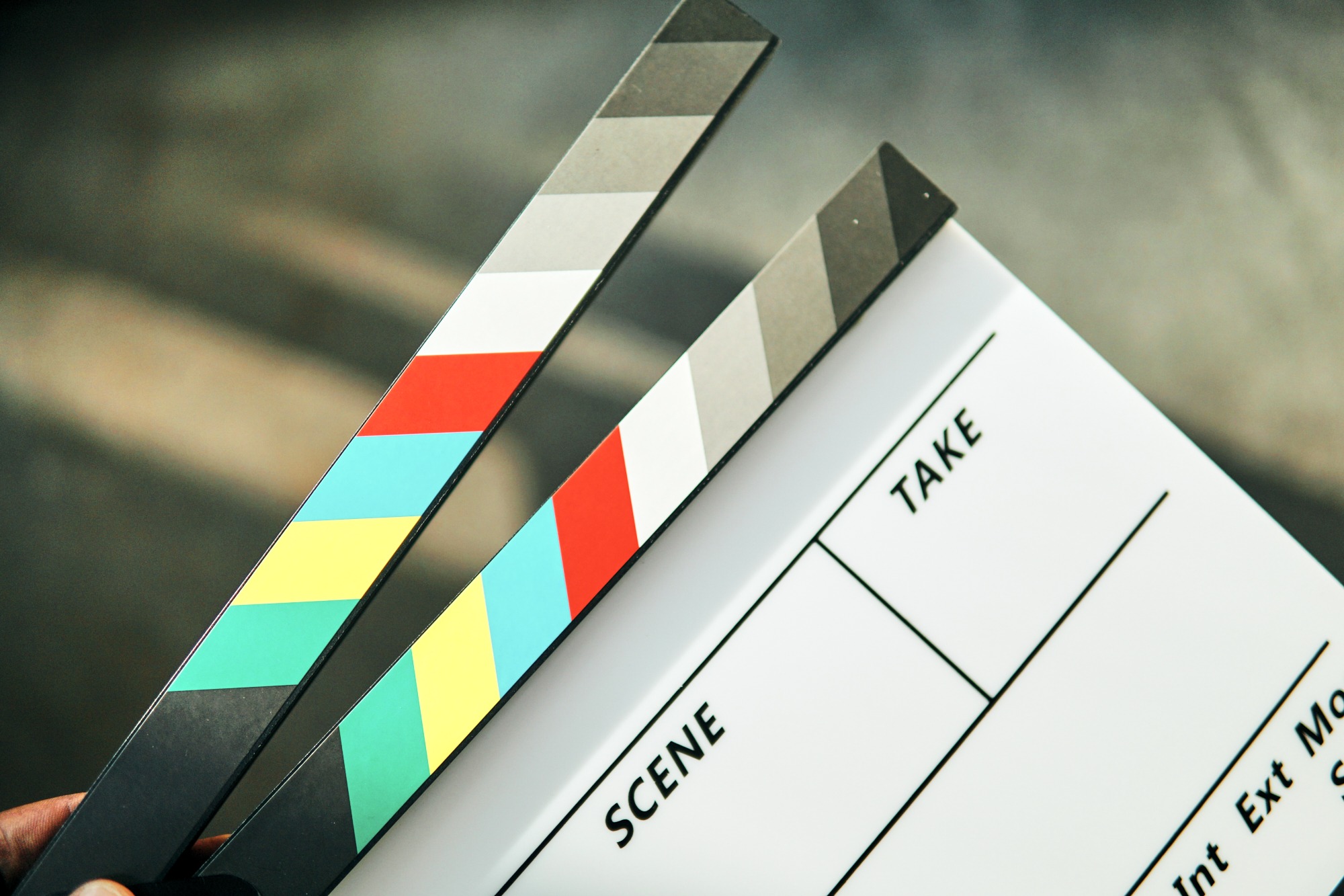 A movie clapperboard being held ready for action