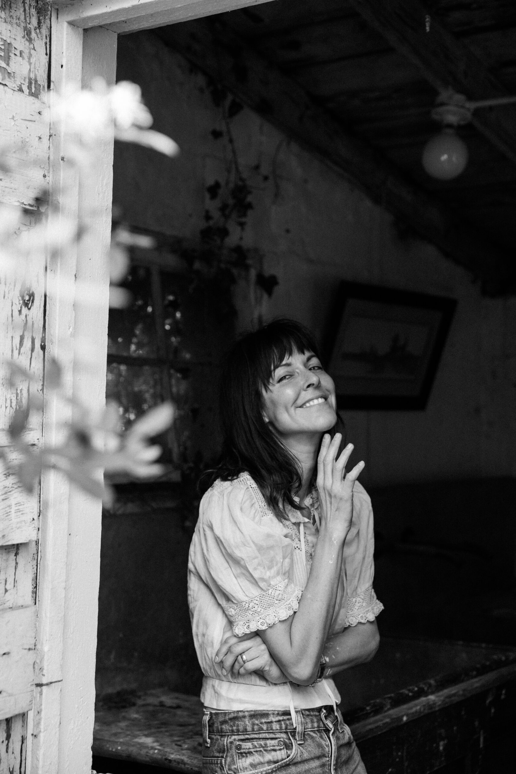 Black and white portrait of smiling Leanne Ford.