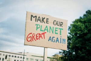Sign reads Make Our Planet Great Again