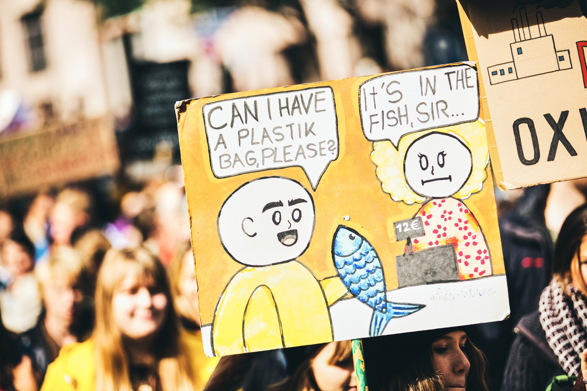 Cartoon drawing fish plastic waste sign funny